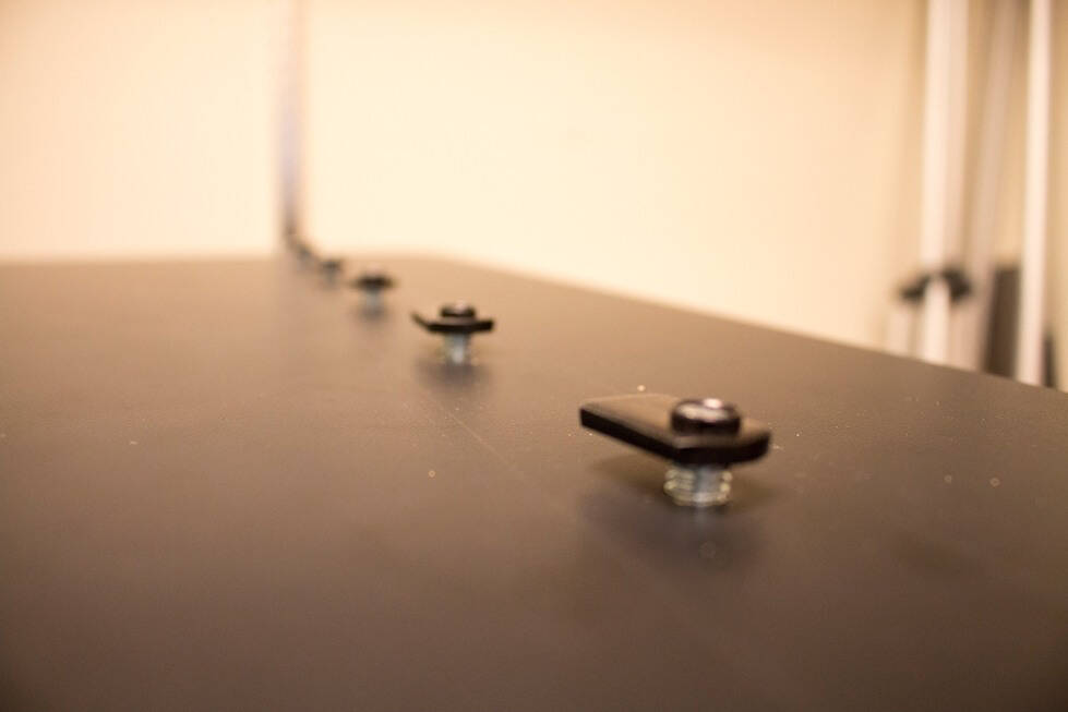 Bolts attached to a tabletop